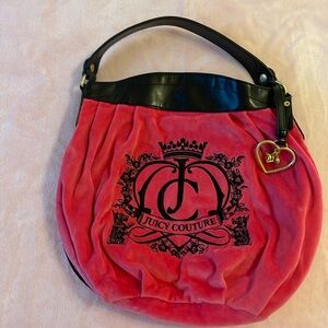 Hot pink vintage juicy couture bag. Small stain on bottom as pictured.